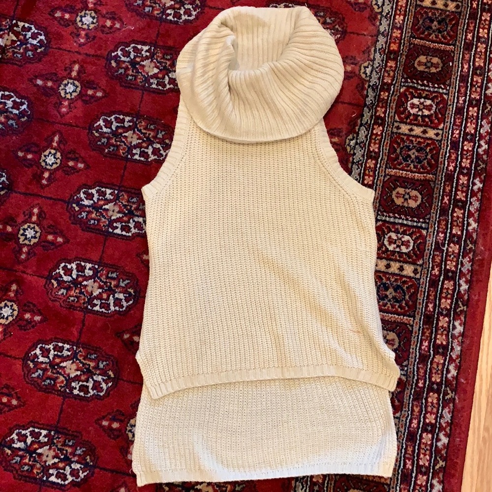 Cream colored cowl neck sleeveless sweater